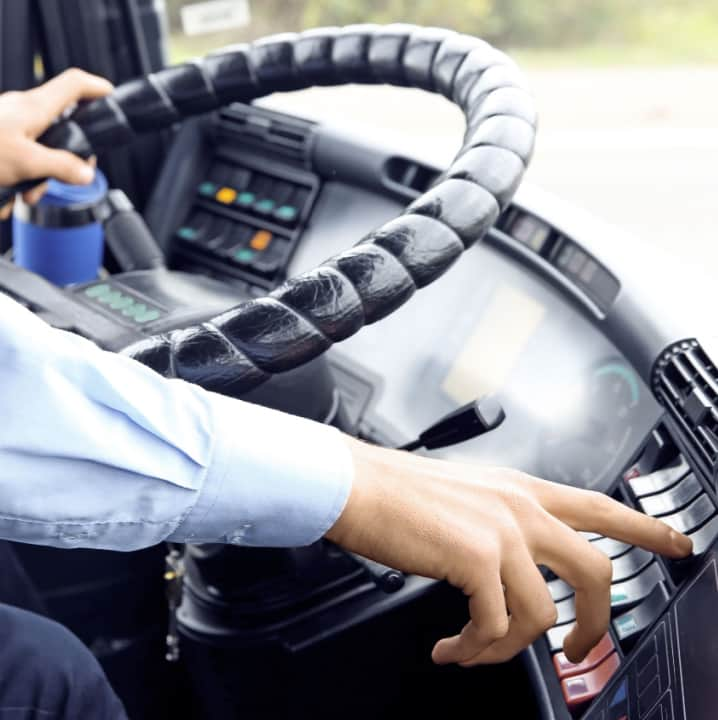 close up of a charter bus driver